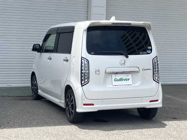 ホンダ Ｎ ＷＧＮ カスタム L ホンダセンシング 高知県 2021(令3)年 1.8万km プラチナホワイトパール ホンダセンシング/ナビ装着用スペシャルパッケージ/充電用USBジャック/プラズマクラスター/シートヒーター/LEDヘッドライト/Bluetooth接続/フロアマット/ETC/レーンキープアシスト/横滑り防止装置/クルーズコントロール/スマートキー