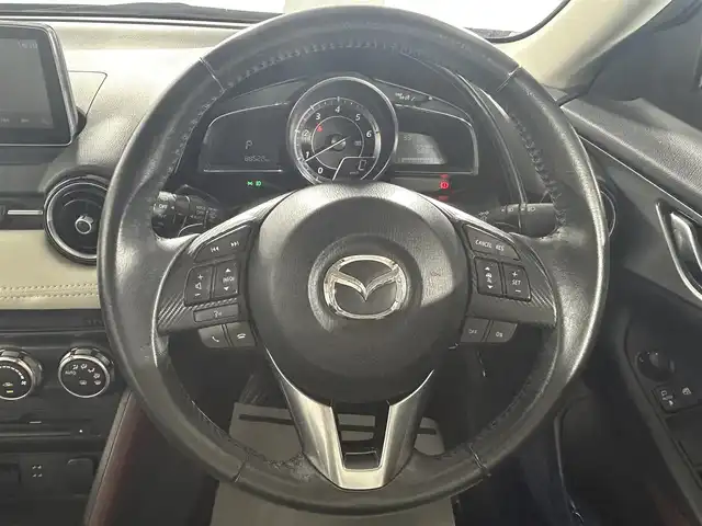 マツダ ＣＸ－３ XD ツーリング 佐賀県 2016(平28)年 8.9万km セラミックM 純正7インチナビ/フルセグTV/CD/DVD/Bluetooth/バックカメラ/衝突被害軽減装置/ブラインドスポットモニター/レーダークルーズコントロール/車線逸脱防止機能/オートライト/LEDヘッドライト/フォグライト/オートワイパー/ヘッドアップディスプレイ/ビルトインETC/前後ドライブレコーダー/運転席・助手席シートヒーター/レザーシート/スマートキー/スペアキー×1/純正フロアマット/純正18インチアルミホイール