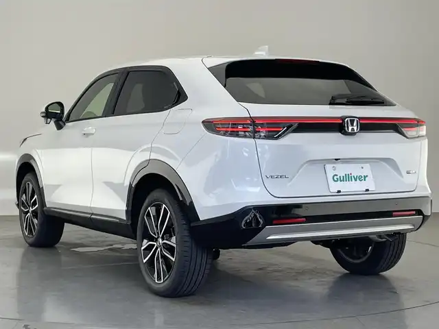 ホンダ ヴェゼル ハイブリッド e:HEV Z 愛知県 2025(令7)年 0.1千km プラチナホワイトパール 登録済未使用車　純正９型DA　BSM　追従クルコン　黒ハーフレザー　フルセグ　ETC２．０　ホンダセンシング　バックカメラ　パドルシフト　シートヒーター　ステアリングヒーター　ワイヤレス充電　禁煙車　コーナーセンサー　USB　LEDライト　フォグ　プッシュスタート　スマートキー