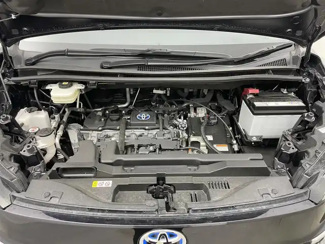 トヨタ ヴォクシー ハイブリッド S－Z 岡山県 2023(令5)年 3万km スパークリングブラックパールクリスタルシャイン 純正１０．５インチディスプレイオーディオナビ/（CD/DVD/BT/フルセグ/Carplay/AndroidAuto/HDMI)/ワンオーナー/快適利便パッケージ/(ハンズフリーデュアルパワースライドドア/パワーバックドア/ナノイーX/ステアリングヒーター/オットマン）/レーダークルーズコントロール/１００Ｖ電源　/ビルトインＥＴＣ２．０/両側電動スライドドア/バックカメラ/衝突軽減ブレーキ/レーンキープアシスト/踏み間違い防止/オートブレーキホールド/ハーフレザーシート/シートヒーター/オートLEDヘッドライト/オートハイビーム/フォグランプ/コーナーセンサー（前/後）/ドライブレコーダー（前/後）/純正17インチAW/純正フロアマット/オートブレーキホールド/禁煙車/スマートキー×1