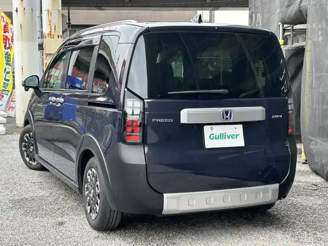 ホンダ フリード ハイブリット e:HEV クロスター 千葉県 2024(令6)年 1.6万km トワイライトミストブラックパール 福祉車両　リアスロープ車/純正9インチナビ/AM/FM/BT/フルセグ/Apple CarPlay/Android Auto/バックカメラ/両側パワースライドドア/衝突軽減システム/クリアランスソナー/アクティブクルーズコントロール/ブラインドスポットインフォメーション/踏み間違い衝突軽減システム/車線逸脱防止機能/ルーフレール/オートリトラミラー/オートブレーキホールド/電子サイドブレーキ/前席シートヒーター/リアクーラー/LEDヘッドライト/LEDフォグランプ/ETC