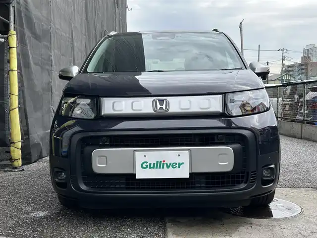 ホンダ フリード ハイブリット e:HEV クロスター 千葉県 2024(令6)年 1.6万km トワイライトミストブラックパール 福祉車両　リアスロープ車/純正9インチナビ/AM/FM/BT/フルセグ/Apple CarPlay/Android Auto/バックカメラ/両側パワースライドドア/衝突軽減システム/クリアランスソナー/アクティブクルーズコントロール/ブラインドスポットインフォメーション/踏み間違い衝突軽減システム/車線逸脱防止機能/ルーフレール/オートリトラミラー/オートブレーキホールド/電子サイドブレーキ/前席シートヒーター/リアクーラー/LEDヘッドライト/LEDフォグランプ/ETC