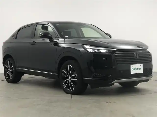 ホンダ ヴェゼル ハイブリッド e:HEV Z 愛知県 2024(令6)年 1.8万km クリスタルブラックパール ワンオーナー/ホンダセンシング/純正9 インチナビ/（Bluetooth/フルセグTV/USB入力/AM/FM）/バックカメラ/置くだけ充電/BSM/ETC2.0/ドライブレコーダー/ハーフレザー/シートヒーター/ステアリングヒーター/電動リアゲード/パドルシフト/純正18インチAW/社外フロアマット/プッシュスタート/スマートキー/LEDライト/