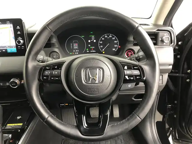 ホンダ ヴェゼル ハイブリッド e:HEV Z 愛知県 2024(令6)年 1.8万km クリスタルブラックパール ワンオーナー/ホンダセンシング/純正9 インチナビ/（Bluetooth/フルセグTV/USB入力/AM/FM）/バックカメラ/置くだけ充電/BSM/ETC2.0/ドライブレコーダー/ハーフレザー/シートヒーター/ステアリングヒーター/電動リアゲード/パドルシフト/純正18インチAW/社外フロアマット/プッシュスタート/スマートキー/LEDライト/