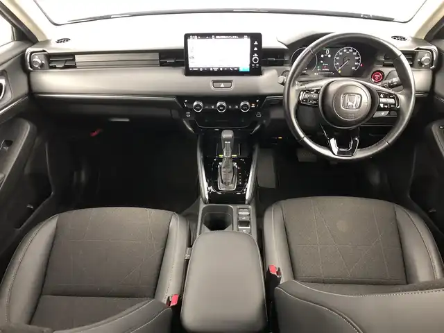 ホンダ ヴェゼル ハイブリッド e:HEV Z 愛知県 2024(令6)年 1.8万km クリスタルブラックパール ワンオーナー/ホンダセンシング/純正9 インチナビ/（Bluetooth/フルセグTV/USB入力/AM/FM）/バックカメラ/置くだけ充電/BSM/ETC2.0/ドライブレコーダー/ハーフレザー/シートヒーター/ステアリングヒーター/電動リアゲード/パドルシフト/純正18インチAW/社外フロアマット/プッシュスタート/スマートキー/LEDライト/