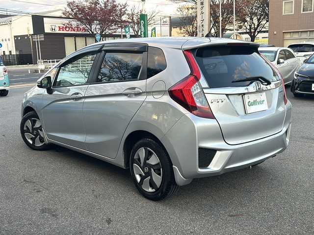 ホンダ フィット ハイブリット Lパッケージ 鳥取県 2014(平26)年 9.2万km アラバスターシルバーメタリック Ｈｏｎｄａインターナビ＋リンクアップフリー＋ETC車載器/Ｌパッケージ/ＬＥＤヘッドライト/コンフォートビューパッケージ/フルオートエアコンディショナー/アームレストコンソール/プライムスムースインテリア/あんしんパッケージ/電動格納ミラー＋プライバシーガラス/AM/FM/CD/DVD/バックカメラ/ドアバイザー/プッシュスタート/ETC/ドライブレコーダー(前後)