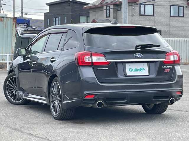 スバル レヴォーグ 1．6STIスポーツアイサイト 道央・札幌 2018(平30)年 7万km ダークグレーメタリック ４WD/純正メモリーナビ/AM/FM/BT/SD/CD/DVD/フルセグ/アイサイト/衝突被害軽減ブレーキ/横滑り防止装置/レーダークルーズコントロール/レーンキープアシスト/クリアランスソナー/ブラインドスポットモニター/バックカメラ/サイドカメラ/フロントカメラ/ビルトインETC/アイドリングストップ/前席パワーシート/D席メモリーシート/前席シートヒーター/レザーシート/革巻きステアリング/ステアリングリモコン/パドルシフト/ガラスルーフ/オートブレーキホールド/デジタルインナーミラー/MTモード付AT/プッシュスタート/スマートキー/LEDヘッドライト/オートライト/フォグランプ/電動格納ミラー/ヒーテッドドアミラー/ウィンカーミラー/純正フロアマット/ドアバイザー/スペアキー