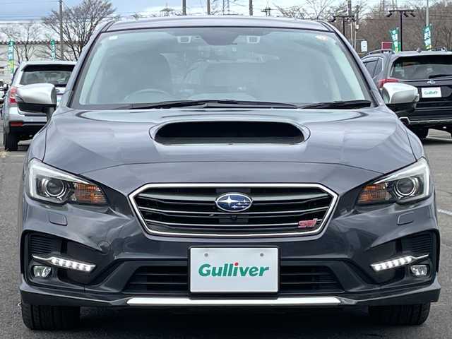 スバル レヴォーグ 1．6STIスポーツアイサイト 道央・札幌 2018(平30)年 7万km ダークグレーメタリック ４WD/純正メモリーナビ/AM/FM/BT/SD/CD/DVD/フルセグ/アイサイト/衝突被害軽減ブレーキ/横滑り防止装置/レーダークルーズコントロール/レーンキープアシスト/クリアランスソナー/ブラインドスポットモニター/バックカメラ/サイドカメラ/フロントカメラ/ビルトインETC/アイドリングストップ/前席パワーシート/D席メモリーシート/前席シートヒーター/レザーシート/革巻きステアリング/ステアリングリモコン/パドルシフト/ガラスルーフ/オートブレーキホールド/デジタルインナーミラー/MTモード付AT/プッシュスタート/スマートキー/LEDヘッドライト/オートライト/フォグランプ/電動格納ミラー/ヒーテッドドアミラー/ウィンカーミラー/純正フロアマット/ドアバイザー/スペアキー