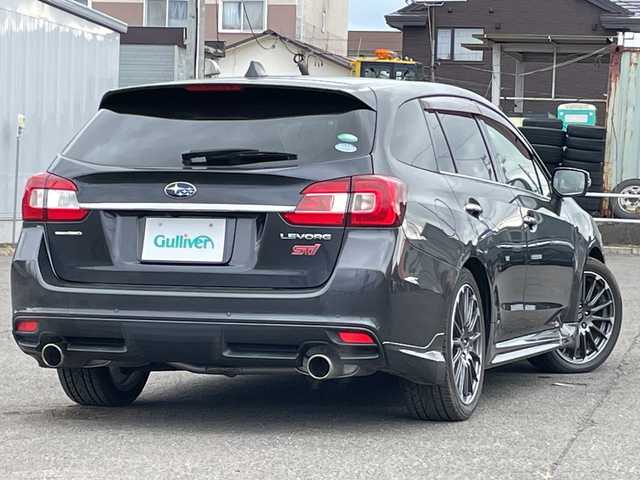 スバル レヴォーグ 1．6STIスポーツアイサイト 道央・札幌 2018(平30)年 7万km ダークグレーメタリック ４WD/純正メモリーナビ/AM/FM/BT/SD/CD/DVD/フルセグ/アイサイト/衝突被害軽減ブレーキ/横滑り防止装置/レーダークルーズコントロール/レーンキープアシスト/クリアランスソナー/ブラインドスポットモニター/バックカメラ/サイドカメラ/フロントカメラ/ビルトインETC/アイドリングストップ/前席パワーシート/D席メモリーシート/前席シートヒーター/レザーシート/革巻きステアリング/ステアリングリモコン/パドルシフト/ガラスルーフ/オートブレーキホールド/デジタルインナーミラー/MTモード付AT/プッシュスタート/スマートキー/LEDヘッドライト/オートライト/フォグランプ/電動格納ミラー/ヒーテッドドアミラー/ウィンカーミラー/純正フロアマット/ドアバイザー/スペアキー