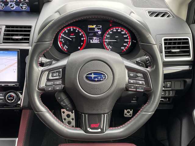 スバル レヴォーグ 1．6STIスポーツアイサイト 道央・札幌 2018(平30)年 7万km ダークグレーメタリック ４WD/純正メモリーナビ/AM/FM/BT/SD/CD/DVD/フルセグ/アイサイト/衝突被害軽減ブレーキ/横滑り防止装置/レーダークルーズコントロール/レーンキープアシスト/クリアランスソナー/ブラインドスポットモニター/バックカメラ/サイドカメラ/フロントカメラ/ビルトインETC/アイドリングストップ/前席パワーシート/D席メモリーシート/前席シートヒーター/レザーシート/革巻きステアリング/ステアリングリモコン/パドルシフト/ガラスルーフ/オートブレーキホールド/デジタルインナーミラー/MTモード付AT/プッシュスタート/スマートキー/LEDヘッドライト/オートライト/フォグランプ/電動格納ミラー/ヒーテッドドアミラー/ウィンカーミラー/純正フロアマット/ドアバイザー/スペアキー