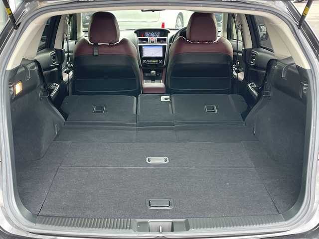 スバル レヴォーグ 1．6STIスポーツアイサイト 道央・札幌 2018(平30)年 7万km ダークグレーメタリック ４WD/純正メモリーナビ/AM/FM/BT/SD/CD/DVD/フルセグ/アイサイト/衝突被害軽減ブレーキ/横滑り防止装置/レーダークルーズコントロール/レーンキープアシスト/クリアランスソナー/ブラインドスポットモニター/バックカメラ/サイドカメラ/フロントカメラ/ビルトインETC/アイドリングストップ/前席パワーシート/D席メモリーシート/前席シートヒーター/レザーシート/革巻きステアリング/ステアリングリモコン/パドルシフト/ガラスルーフ/オートブレーキホールド/デジタルインナーミラー/MTモード付AT/プッシュスタート/スマートキー/LEDヘッドライト/オートライト/フォグランプ/電動格納ミラー/ヒーテッドドアミラー/ウィンカーミラー/純正フロアマット/ドアバイザー/スペアキー