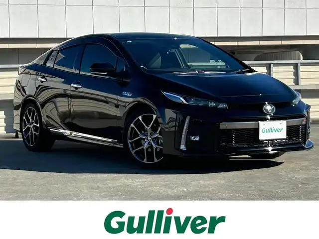 トヨタ プリウス ＰＨＶ S GRスポーツ 静岡県 2021(令3)年 2万km アティチュードブラックマイカ TRDエアロ/トヨタセーフティーセンス/・プリクラッシュセーフティ/・レーントレーシングアシスト/・アダプティブハイビームシステム〈AHS〉/・オートマチックハイビーム〈AHB〉/・レーダークルーズコントロール/純正8インチディスプレイオーディオ/FM/AM/Bluetooth/USB/フルセグTV/レーダークルーズコントロール/ビルトインETC2.0/ハーフレザーシート/前席シートヒーター/バックカメラ/オートライト/フォグランプ/純正フロアマット