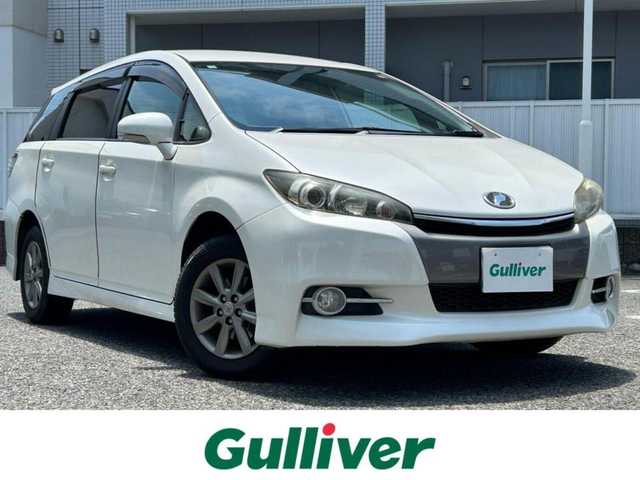 トヨタ ウィッシュ 1．8S 愛知県 2012(平24)年 13.4万km ホワイトパールクリスタルシャイン ワンオーナー/純正SDナビ/(FM/AM/CD/DVD/BT/DS/USB/VTR/ワンセグ)/バックカメラ/4WD/エンジンスターター/デジタルインナーミラー/パドルシフト/HIDヘッドライト/フォグランプ/純正AW15インチ/電動格納ミラー/アイドリングストップ/純正フロアマット/ETC/プッシュスタート/スマートキー・スペアキー１本/ステアリングリモコン/ABS/保証書
