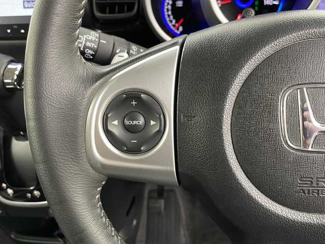 ホンダ Ｎ ＢＯＸ カスタム G ターボ Lパッケージ 道央・札幌 2015(平27)年 8.1万km スマートブラック ・4WD / ターボ/・純正8インチナビゲーション/（型番：VXM-155VFEi）/【CD/DVD/SD/BT/TV】/・バックカメラ/・社外フリップダウンモニター/・クルーズコントロール/・本革巻ステアリング/パドルシフト/・ステアリングスイッチ/・両側パワースライドドア/・前席シートヒーター/・HIDオートライト/・シートバックテーブル/・リアドアサンシェード/・VSA（ABS＋TCS＋横すべり抑制）/・ドアバイザー