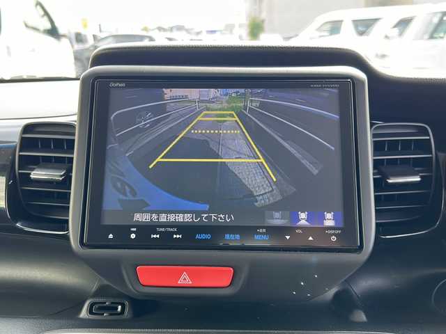 ホンダ Ｎ ＢＯＸ カスタム G ターボ Lパッケージ 石川県 2015(平27)年 8.1万km スマートブラック 4WD / ターボ/純正8インチナビゲーション/（型番：VXM-155VFEi）/【CD/DVD/SD/BT/TV】/バックカメラ/フリップダウンモニター/クルーズコントロール/本革巻ステアリング/パドルシフト/ステアリングスイッチ/両側パワースライドドア/前席シートヒーター/シートバックテーブル/リアドアサンシェード/リアドアイージークローザー/ドアバイザー/オートリトラミラー/HIDオートライト/VSA（ABS＋TCS＋横すべり抑制）/プッシュスタート/アイドリングストップ
