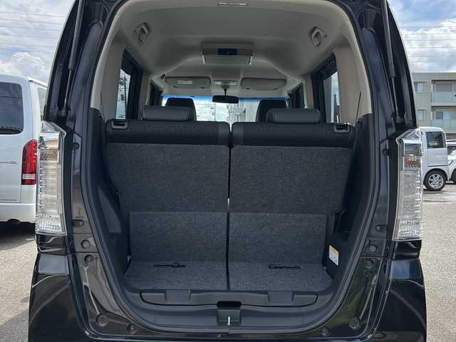 ホンダ Ｎ ＢＯＸ カスタム G ターボ Lパッケージ 石川県 2015(平27)年 8.1万km スマートブラック 4WD / ターボ/純正8インチナビゲーション/（型番：VXM-155VFEi）/【CD/DVD/SD/BT/TV】/バックカメラ/フリップダウンモニター/クルーズコントロール/本革巻ステアリング/パドルシフト/ステアリングスイッチ/両側パワースライドドア/前席シートヒーター/シートバックテーブル/リアドアサンシェード/リアドアイージークローザー/ドアバイザー/オートリトラミラー/HIDオートライト/VSA（ABS＋TCS＋横すべり抑制）/プッシュスタート/アイドリングストップ