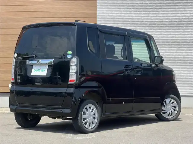 ホンダ Ｎ ＢＯＸ G Lパッケージ 秋田県 2014(平26)年 7.4万km スマートブラック 純正オーディオ（AM/FM/CD）/４WD/スマートキー/片側パワスラ/アイドリングストップ/プッシュスタート/純正フロアマット/純正ドアバイザー/ステアリングスイッチ/オートエアコン/パワーステアリング/パワーウィンドウ/レベライザー/フルフラットシート/チップアップシート/電動格納ウィンカーミラー/取扱説明書