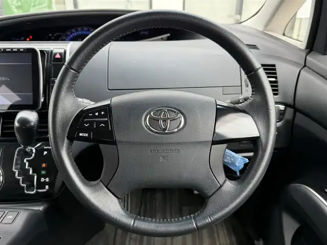 トヨタ エスティマ ハイブリッド アエラス プレミアムエディション 道南・函館 2013(平25)年 11.8万km ブラック 4WD/社外ナビ/フルセグＴＶ/バックカメラ/両側パワースライドドア/エンジンスターター/クルーズコントロール/寒冷地仕様/オートライト/キセノンヘッドライト/パワーシート/オットマン/ハーフレザーシート/スマートキー×2/禁煙車