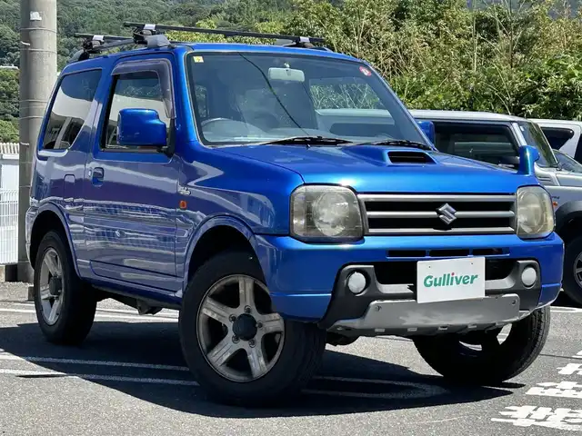 スズキ ジムニー ワイルドウィンド 長崎県 2006(平18)年 8.8万km パールメタリックカシミールブルー パートタイム4WD/ターボ搭載車/取扱説明書/純正ミュージックプレーヤー/純正16インチアルミホイール/純正フロアマット/シートヒーター/SRSエアバッグ/ABS