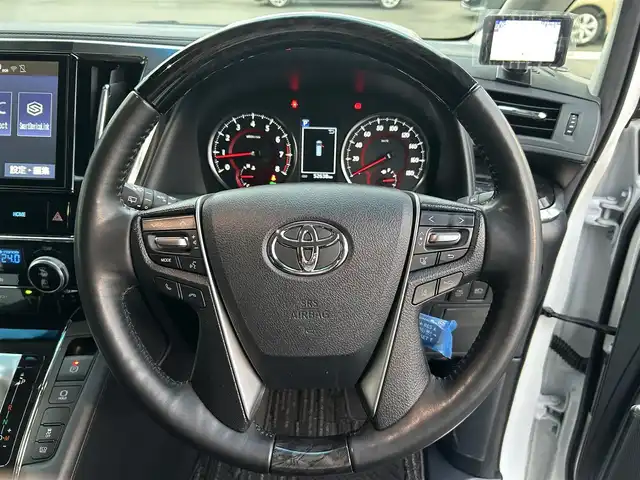トヨタ アルファード S Cパッケージ 福岡県 2019(令1)年 5.3万km ホワイトパールクリスタルシャイン 純正10型メモリナビ(フルセグTV/CD/DVD/BT)バックモニター後席モニター二眼LEDヘッドライトトヨタセーフティーコーナーセンサー電動リアゲート両側パワスラレーダークルコンドラレコETCシートヒーターエアシート純正フロアマット純正18インチアルミホイールプッシュスタートスマートキー