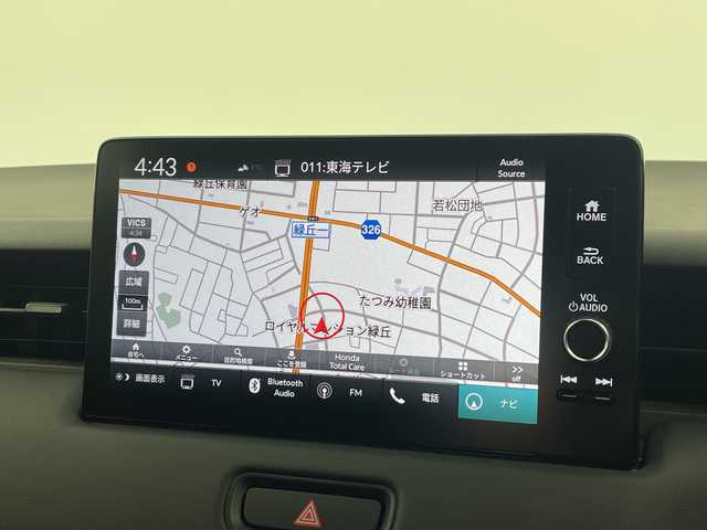 ホンダ ヴェゼル ハイブリッド e:HEV Z 愛知県 2025(令7)年 0.1千km パール 登録済未使用車　5km/ホンダコネクトディスプレイ/・ナビゲーション機能/・フルセグテレビ/・Bluetooth/バックカメラ/ETC2.0/ワイヤレス充電器/ステアリングスイッチ/ベルリナブラックフロントグリル/ハンズフリーアクセスパワーテールゲート/LEDシーケンシャルターンシグナルランプ/ブラインドスポットインフォメーション/後退出庫サポート/ホンダセンシング/・衝突軽減ブレーキ/・先行車発信お知らせ機能/・歩行者事故低減システム/・路外逸脱抑制機能/・標識認識機能/・渋滞追従機能アダプティブクルーズコントロール/・車線維持支援システム/・トラフィックジャムアシスト/・誤発信誤後退抑制機能/・アダプティブドライビングビーム/・近距離衝突軽減ブレーキ/・急アクセル抑制機能/ステアリングヒーター/シートヒーター/ドライブモードセレクター