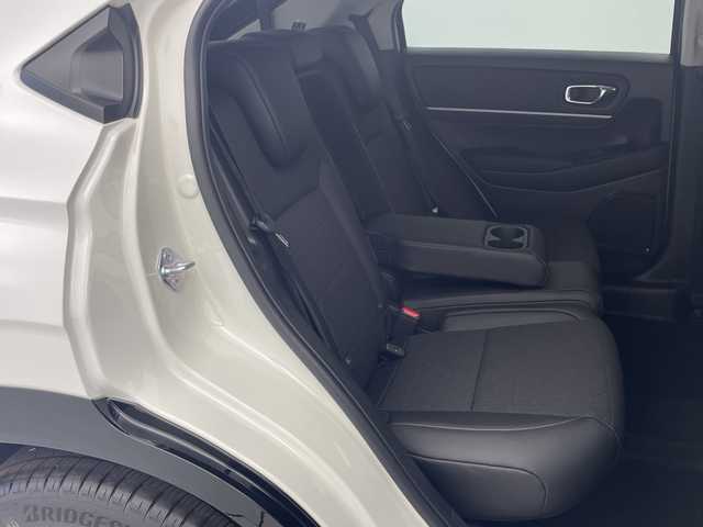 ホンダ ヴェゼル ハイブリッド e:HEV Z 愛知県 2025(令7)年 0.1千km パール 登録済未使用車　5km/ホンダコネクトディスプレイ/・ナビゲーション機能/・フルセグテレビ/・Bluetooth/バックカメラ/ETC2.0/ワイヤレス充電器/ステアリングスイッチ/ベルリナブラックフロントグリル/ハンズフリーアクセスパワーテールゲート/LEDシーケンシャルターンシグナルランプ/ブラインドスポットインフォメーション/後退出庫サポート/ホンダセンシング/・衝突軽減ブレーキ/・先行車発信お知らせ機能/・歩行者事故低減システム/・路外逸脱抑制機能/・標識認識機能/・渋滞追従機能アダプティブクルーズコントロール/・車線維持支援システム/・トラフィックジャムアシスト/・誤発信誤後退抑制機能/・アダプティブドライビングビーム/・近距離衝突軽減ブレーキ/・急アクセル抑制機能/ステアリングヒーター/シートヒーター/ドライブモードセレクター