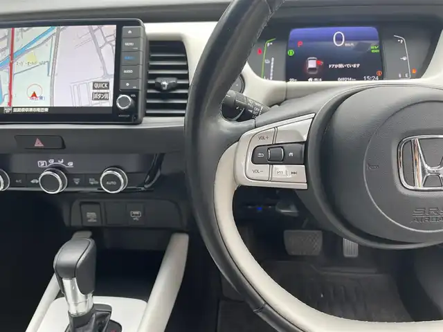ホンダ フィット e:HEVホーム 滋賀県 2020(令2)年 7万km プレミアムグラマラスブロンズP 純正9インチナビ/【Bluetooth/CD/DVD/フルセグTV/USB】/ハーフレザーシート/ホンダセンシング/・衝突軽減ブレーキ/・誤発進抑制機能/・後方誤発進抑制機能/・近距離衝突軽減ブレーキ/・歩行者事故低減ステアリング/・路外逸脱抑制機能/・渋滞追従機能付アダプティブクルーズコントロール/・車線維持支援システム/・先行車発進お知らせ機能/・標識認識機能/・オートハイビーム/バックカメラ/クリアランスソナー/LEDヘッドライト/ビルトインETC/前方ドライブレコーダー/電動パーキングブレーキ/オートブレーキホールド/純正フロアマット/ドアバイザー/プッシュスタート/スマートキー/ステアリングリモコン