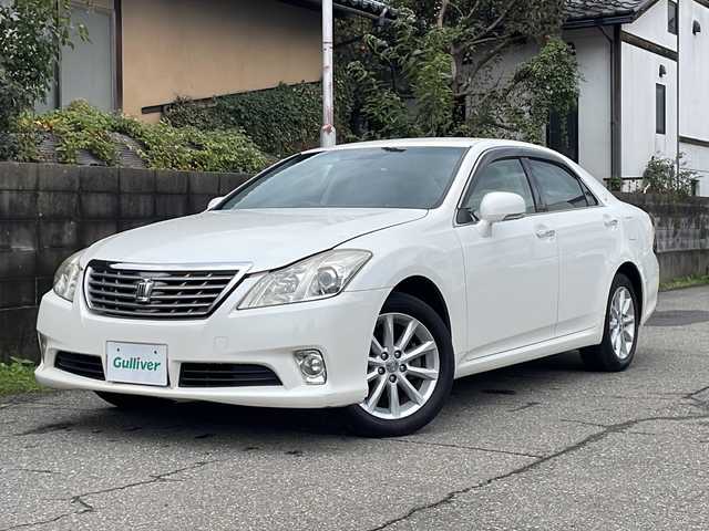 トヨタ クラウン ロイヤル ロイヤルサルーン i－Four 福井県 2010(平22)年 13.7万km ホワイトパールクリスタルシャイン メーカー純正HDDナビゲーション/（CD/DVD）/フルセグテレビ/バックカメラ/クルーズコントロール/前席パワーシート/純正17インチアルミホイール/ETC(ビルトイン)/４WD/HIDヘッドライト/フォグランプ/オートリトラミラー/ステアリングリモコン/プッシュスタート/スマートキー/保証書/取扱説明書