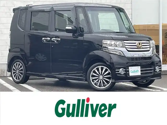 ホンダ Ｎ ＢＯＸ G ターボパッケージ 宮崎県 2013(平25)年 5万km クリスタルブラックパール 〇ターボ/〇社外ナビ/〇フルセグTV/〇バックカメラ/〇フリップダウンモニター/〇両側パワースライドドア/〇ETC/〇キノセンヘッドランプ/〇オートライト/〇クルーズコントロール/〇電動格納ミラー/〇革巻きステアリング/〇パドルシフト/〇オートエアコン/〇純正15インチアルミ/〇プッシュエンジンスタート/スマートキー/〇禁煙車/〇盗難防止装置/〇エアバックW