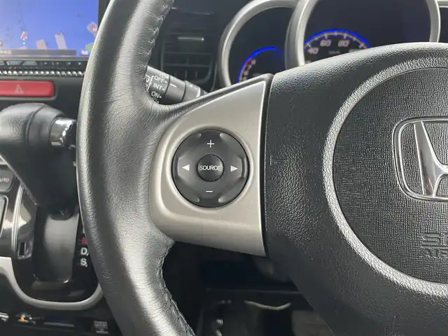 ホンダ Ｎ ＢＯＸ G ターボパッケージ 宮崎県 2013(平25)年 5万km クリスタルブラックパール 〇ターボ/〇社外ナビ/〇フルセグTV/〇バックカメラ/〇フリップダウンモニター/〇両側パワースライドドア/〇ETC/〇キノセンヘッドランプ/〇オートライト/〇クルーズコントロール/〇電動格納ミラー/〇革巻きステアリング/〇パドルシフト/〇オートエアコン/〇純正15インチアルミ/〇プッシュエンジンスタート/スマートキー/〇禁煙車/〇盗難防止装置/〇エアバックW