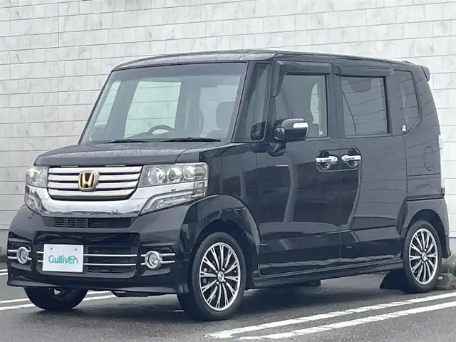 ホンダ Ｎ ＢＯＸ G ターボパッケージ 宮崎県 2013(平25)年 5万km クリスタルブラックパール 〇ターボ/〇社外ナビ/〇フルセグTV/〇バックカメラ/〇フリップダウンモニター/〇両側パワースライドドア/〇ETC/〇キノセンヘッドランプ/〇オートライト/〇クルーズコントロール/〇電動格納ミラー/〇革巻きステアリング/〇パドルシフト/〇オートエアコン/〇純正15インチアルミ/〇プッシュエンジンスタート/スマートキー/〇禁煙車/〇盗難防止装置/〇エアバックW