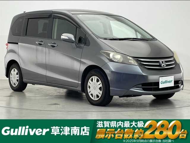 ホンダ フリード G ハイウェイエディション 滋賀県 2010(平22)年 5.6万km ポリッシュドメタルメタリック 社外ナビ/(CD/DVD/フルセグ/USB)/片側パワースライドドア/ETC/オートライト/LEDヘッドライト/電動格納ミラー/純正フロアマット/スペアキー