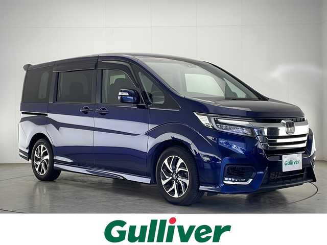 ホンダ ステップワゴン スパーダ ホンダセンシング 宮崎県 2017(平29)年 7.3万km オブシダンブルーパール 禁煙車/ホンダセンシング/純正ナビTV/（VXM-185VFi/CD/DVD/Bluetooth/フルセグTV)/純正11型リアフリップダウンモニター/（VM-155EN）/純正バックカメラ/純正ビルトインETC/純正LEDオートライト/純正LEDフォグ/純正16インチアルミ/純正エアロ/純正ルーフエンドスポイラー/純正フロアマット/両側電動スライドドア/レーンディパーチャーアラート/アダプティブクルーズコントロール/パドルシフト/本革巻ハンドル/デュアルオートエアコン/ウインカードアミラー/スマートキー/プッシュエンジンスタート/スペアキー/新車時保証書/取扱い説明書