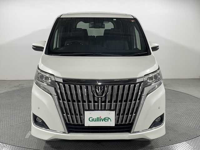トヨタ エスクァイア Gi 広島県 2018(平30)年 5.8万km ホワイトパールクリスタルシャイン 禁煙車/純正ナビ/フリップダウンモニター/両側パワースライドドア/デジタルインナーミラー/バックカメラ/シートヒーター/純正フロアマット/純正15インチアルミホーイル/オートマチックハイビーム/レーンキープ/ETC