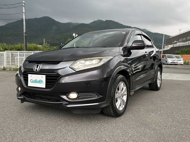 ホンダ ヴェゼル ハイブリッド X 山梨県 2015(平27)年 5.5万km ルーセブラックM 4WD/純正ナビ/フルセグテレビ/Bluetooth接続/メモリナビ/バックカメラ/ETC/ドライブレコーダー/MTモード付AT/クルーズコントロール/パワーウィンドウ/スマートキー/純正フロアマット/純正アルミホイール/ABS/横滑り防止/オートライト/LEDライト