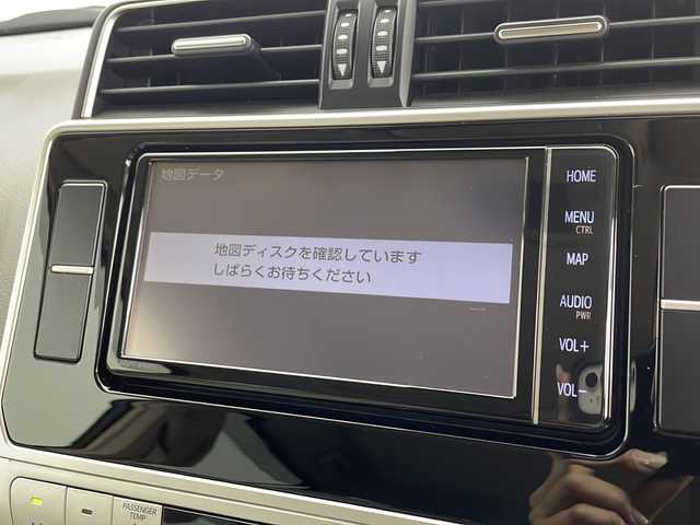 トヨタ ランドクルーザー プラド TX Lパッケージ 鹿児島県 2023(令5)年 1.1万km ホワイトパールクリスタルシャイン 純正ナビ/（CD/DVD/BT/フルセグTV）/サンルーフ/レーダークルーズコントロール/プリクラッシュセーフティ/レーンキープアシスト/パワーシート/ベージュ革シート/シートヒーター/シートベンチレーション/オートライト/オートマチックハイビーム/バックカメラ/ETC2.0