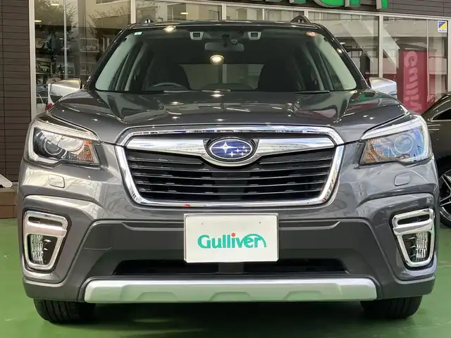 スバル フォレスター ハイブリッド アドバンス 神奈川県 2021(令3)年 2.9万km マグネタイトグレーメタリック ワンオーナー/アイサイトコアテクノロジー/・プリクラッシュブレーキ/・後退時ブレーキアシスト/・AT誤発進抑制機能/・AT後後進抑制制御/・ツーリングアシスト/・全車速追従機能付/・レーダークルーズコントロール/・定速クルーズコントロール/・ECOクルーズコントロール/・車線逸脱抑制/車線逸脱警報/・ふらつき警報/・先行車発進お知らせ機能/・スバルリヤビークルディテクション/（後側方警戒システム）/・アダプティブドライビングビーム/純正ナビゲーション/地上デジタルテレビ/DIATONE SOUND/Bカメラ/ドライブレコーダー/パドルシフト/ステアリングスイッチ/LEDヘッドライト・フォグライト/ハーフレザーシート/ステアリングヒーター/前席電動・メモリー・ヒートシート/ETC/スマートキー/純正ルーフレール/純正アルミホイール18インチ/純正Fマット/取扱説明書/メーカー保証書/点検整備記録簿/・R34567年（ディーラー様にて実施）