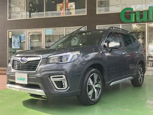 スバル フォレスター ハイブリッド アドバンス 神奈川県 2021(令3)年 2.9万km マグネタイトグレーメタリック ワンオーナー/アイサイトコアテクノロジー/・プリクラッシュブレーキ/・後退時ブレーキアシスト/・AT誤発進抑制機能/・AT後後進抑制制御/・ツーリングアシスト/・全車速追従機能付/・レーダークルーズコントロール/・定速クルーズコントロール/・ECOクルーズコントロール/・車線逸脱抑制/車線逸脱警報/・ふらつき警報/・先行車発進お知らせ機能/・スバルリヤビークルディテクション/（後側方警戒システム）/・アダプティブドライビングビーム/純正ナビゲーション/地上デジタルテレビ/DIATONE SOUND/Bカメラ/ドライブレコーダー/パドルシフト/ステアリングスイッチ/LEDヘッドライト・フォグライト/ハーフレザーシート/ステアリングヒーター/前席電動・メモリー・ヒートシート/ETC/スマートキー/純正ルーフレール/純正アルミホイール18インチ/純正Fマット/取扱説明書/メーカー保証書/点検整備記録簿/・R34567年（ディーラー様にて実施）