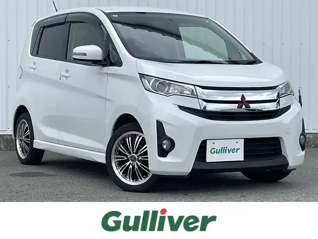 三菱 ｅＫカスタム T 福岡県 2013(平25)年 9万km シルキーホワイト 純正ナビ（ＭＰ３１０－Ｗ）/CD　DVD　ワンセグTV　Bluetooth/バックカメラ　/スマートキー　/ｐｕｓｈスタート　/ＥＴＣ　/シートヒーター