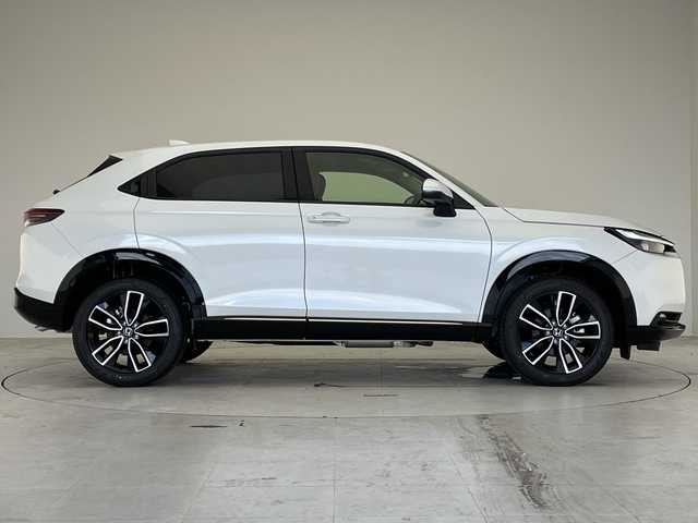 ホンダ ヴェゼル ハイブリッド e:HEV Z 愛知県 2025(令7)年 0.1千km プラチナホワイトパール 登録済未使用車/フロントグリル/純正9型ディズプレイオーディオナビ/レーダークルーズコントロール/シートヒーター/バックカメラ/コーナーセンサー/純正アルミホイール/ETC2.0/ブラインドスポットモニター/LEDヘッドライト/パドルシフト/ダウンヒルアシストコントロール/オートマチックハイビーム/ワイヤレス充電器/衝突軽減システム/Bluetooth/フルセグ/ステアリングスイッチ/スマートキー/プッシュスタート