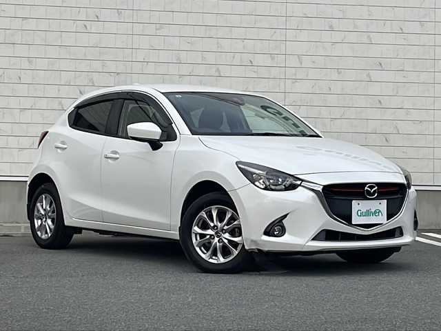 マツダ デミオ XD 山形県 2015(平27)年 8万km スノーフレイクホワイトパールマイカ 禁煙車/トラクションコントロールシステム（TCS）/ブラインドスポットモニター（BSM）/レーンキープ・アシスト・システム (LAS) /純正SDナビ/（フルセグ/DVD/CD/BT/AUX/USB）/バックカメラ/ETC/クルーズコントロール/アイドリングストップ/LEDヘッドライト/フォグランプ/純正15インチAW/プッシュスタート