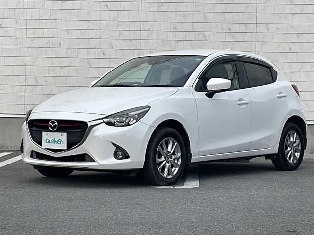 マツダ デミオ XD 山形県 2015(平27)年 8万km スノーフレイクホワイトパールマイカ 禁煙車/トラクションコントロールシステム（TCS）/ブラインドスポットモニター（BSM）/レーンキープ・アシスト・システム (LAS) /純正SDナビ/（フルセグ/DVD/CD/BT/AUX/USB）/バックカメラ/ETC/クルーズコントロール/アイドリングストップ/LEDヘッドライト/フォグランプ/純正15インチAW/プッシュスタート