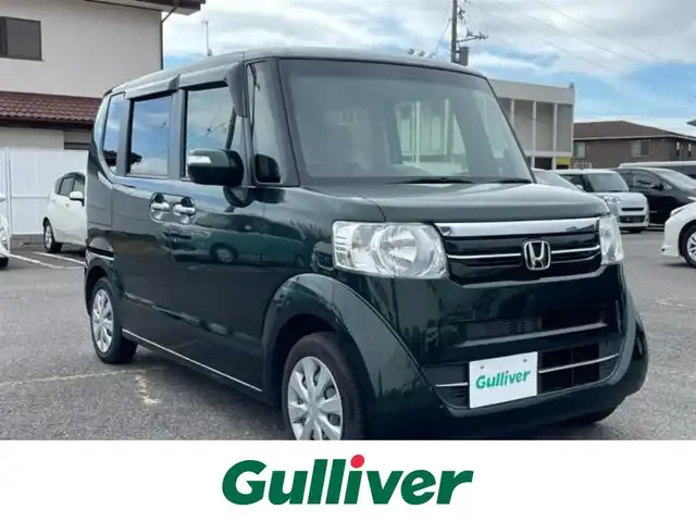 ホンダ Ｎ ＢＯＸ G SSパッケージ 茨城県 2017(平29)年 1.8万km ブリティッシュグリーンP 純正7インチナビ/（AM/FM/Bluetooth接続/CD/DVD/フルセグTV）/バックカメラ/純正ETC/片側パワースライドドア/前席シートヒーター/純正フロアマット/スマートキー/ステアリングスイッチ/ドアバイザー/ヘッドライトレベライザー/横滑り防止装置/プッシュスタート