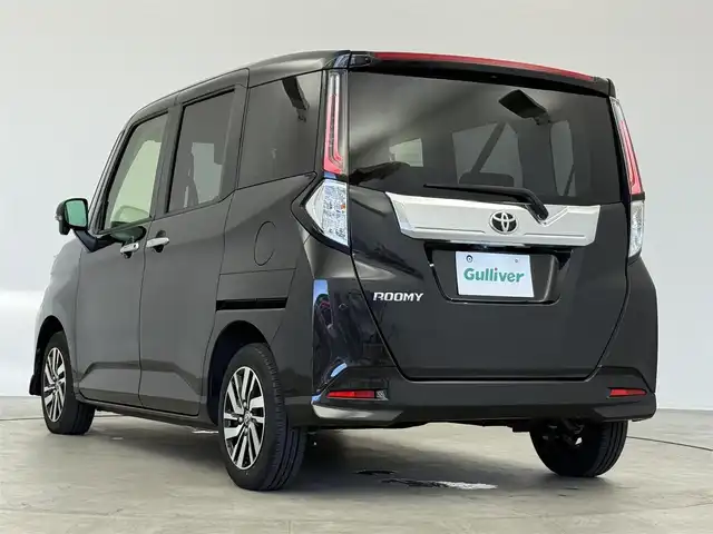 トヨタ ルーミー カスタムG 愛知県 2023(令5)年 2.1万km ブラックマイカメタリック スマートアシスト/純正9インチナビ/（Bluetooth/CD/DVD/AM/FM）/全方位カメラ/アダプティブクルーズコントロール/ETC/両側パワーバックドア/シートヒーター/オートライト/純正LEDライト/純正AW/電動格納ミラー/後席テーブル/電子パーキング/オートホールド/テレビキャンセラー/プッシュスタート/スマートキー