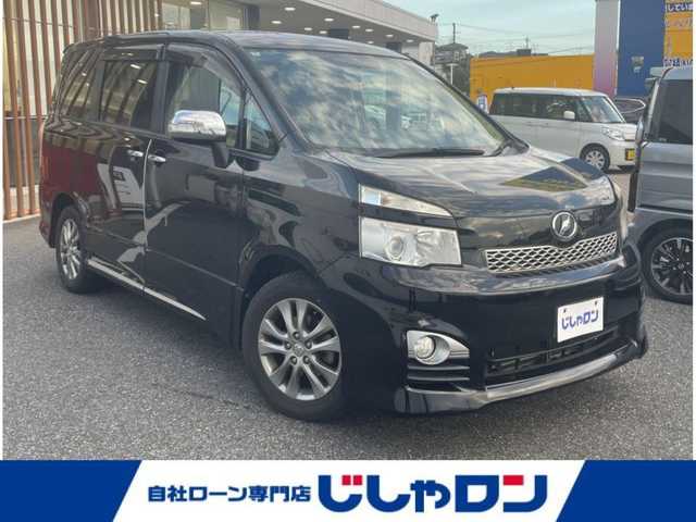 トヨタ ヴォクシー ZS 煌Ⅱ 千葉県 2012(平24)年 8.6万km ブラック (株)IDOMが運営する【じしゃロン八千代店】の自社ローン対象車両になります。こちらは現金またはオートローンご利用時の価格です。自社ローンご希望の方は別途その旨お申付け下さい/純正ナビ/純正CD/DVD/SD/BT/DTV/フリップダウンモニター/両側パワースライドドア/HID/スマートキー