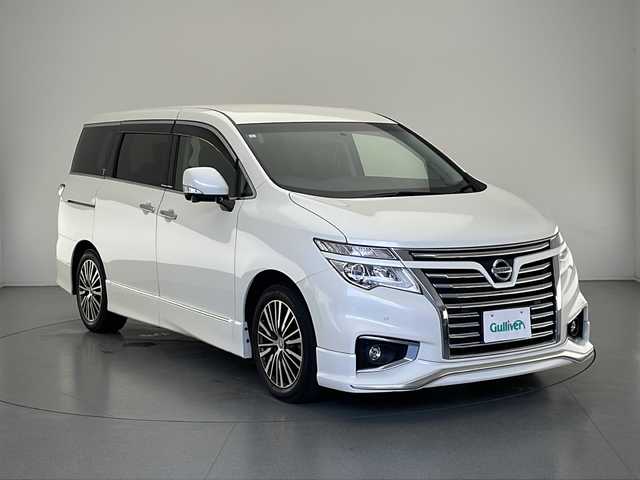 日産 エルグランド 250ハイウェイスター プレミアム 長野県 2015(平27)年 4.7万km ブリリアントホワイトパール 4WD/ワンオーナー/後席フリップダウンモニター/カーテンエアバッグ/横滑り防止装置/コーナーセンサー/純正ナビ/アラウンドビューモニター/フルセグTV/クルーズコントロール/両側パワースライドドア/パワーバックドア/AC100V100Wコンセント/シートヒーター/前席パワーシート（運転席メモリー機能付）/リアオットマンシート/MTモード付きAT/ビルトインETC/ECOモード/プッシュスタート/LEDヘッドライト/LEDフォグランプ/純正18インチアルミホイール/純正フロアマット/ドアバイザー/革巻きステアリング/リア全席サンシェード/スペアキー×1