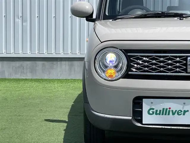 スズキ ラパン モード 香川県 2018(平30)年 3.6万km フォーンベージュM 登録時走行距離：35201km/ディーラー純正8型ナビ/　CD DVD BT フルセグTV/ナビ連動式ドライブレコーダー/ビルトインETC/シートヒーター/衝突被害軽減装置/アイドリングストップ/横滑り防止装置/HIDヘッドライト/オートライト/ベンチシート/ステアリングスイッチ/プッシュスタート/スマートキー/スペアキー