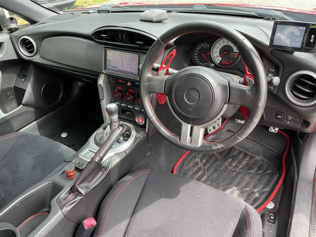 トヨタ ８６ GT 栃木県 2014(平26)年 13.3万km ライトニングレッド (株)IDOMが運営する【じしゃロン宇都宮店】の自社ローン対象車両になります。こちらは現金またはオートローンご利用時の価格です。自社ローンご希望の方は別途その旨お申付け下さい/社外ナビ/CD/DVD/BT/TV/社外マフラー/ETC/バックカメラ/ドライブレコーダー/プッシュスタート/スマートキー/社外セキュリティ/社外ツイーター/パドルシフト/純正17インチAW