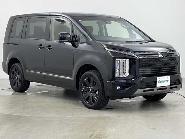 三菱 デリカＤ：５ シャモニー 千葉県 2025(令7)年 0.1千km 黒Ⅱ ・寒冷地仕様/・11インチALPINEナビ&CD&DVD&BT&HDMI&AppleCarplay&AndroidAuto/・12.8インチALPINEフリップダウンモニター/・パワーバックドア/・両側パワースライドドア/・マルチアラウンドモニター/・e-Assist/・衝突被害軽減ブレーキシステム/・車線逸脱警報システム/・レーダークルーズコントロールシステム/・誤発進抑制機能/・後側方車両検知警報システム/・後退時交差車両検知警報システム/・ブラインドスポットモニター/・アイドリングストップ/・横滑り防止装置/・ECOモード/・センターデフロック/・前席シートヒーター/・D席パワーシート/・ハーフレザーシート/・ステアリングヒーター/・ステアリングスイッチ/・革巻きステアリング/・電動パーキングブレーキ/・プッシュスタート/・LEDヘッドライト/・フォグランプ/・オートマチックハイビーム/・オートライト/・スマートキー/・スペアキー