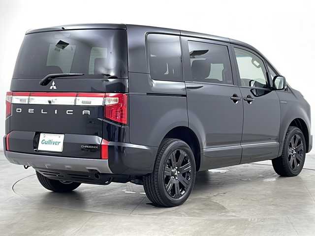 三菱 デリカＤ：５ シャモニー 千葉県 2025(令7)年 0.1千km 黒Ⅱ ・寒冷地仕様/・11インチALPINEナビ&CD&DVD&BT&HDMI&AppleCarplay&AndroidAuto/・12.8インチALPINEフリップダウンモニター/・パワーバックドア/・両側パワースライドドア/・マルチアラウンドモニター/・e-Assist/・衝突被害軽減ブレーキシステム/・車線逸脱警報システム/・レーダークルーズコントロールシステム/・誤発進抑制機能/・後側方車両検知警報システム/・後退時交差車両検知警報システム/・ブラインドスポットモニター/・アイドリングストップ/・横滑り防止装置/・ECOモード/・センターデフロック/・前席シートヒーター/・D席パワーシート/・ハーフレザーシート/・ステアリングヒーター/・ステアリングスイッチ/・革巻きステアリング/・電動パーキングブレーキ/・プッシュスタート/・LEDヘッドライト/・フォグランプ/・オートマチックハイビーム/・オートライト/・スマートキー/・スペアキー